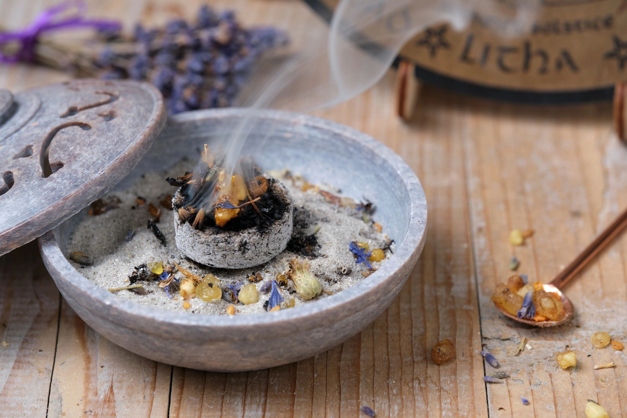 Aromatic incense bowl with rising fragrant smoke